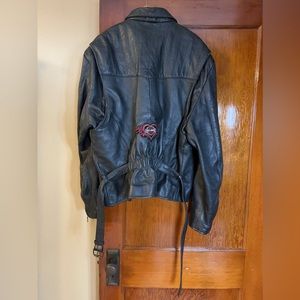 Raider genuine leather jacket with Harley Davidson patch on back of jacket.
